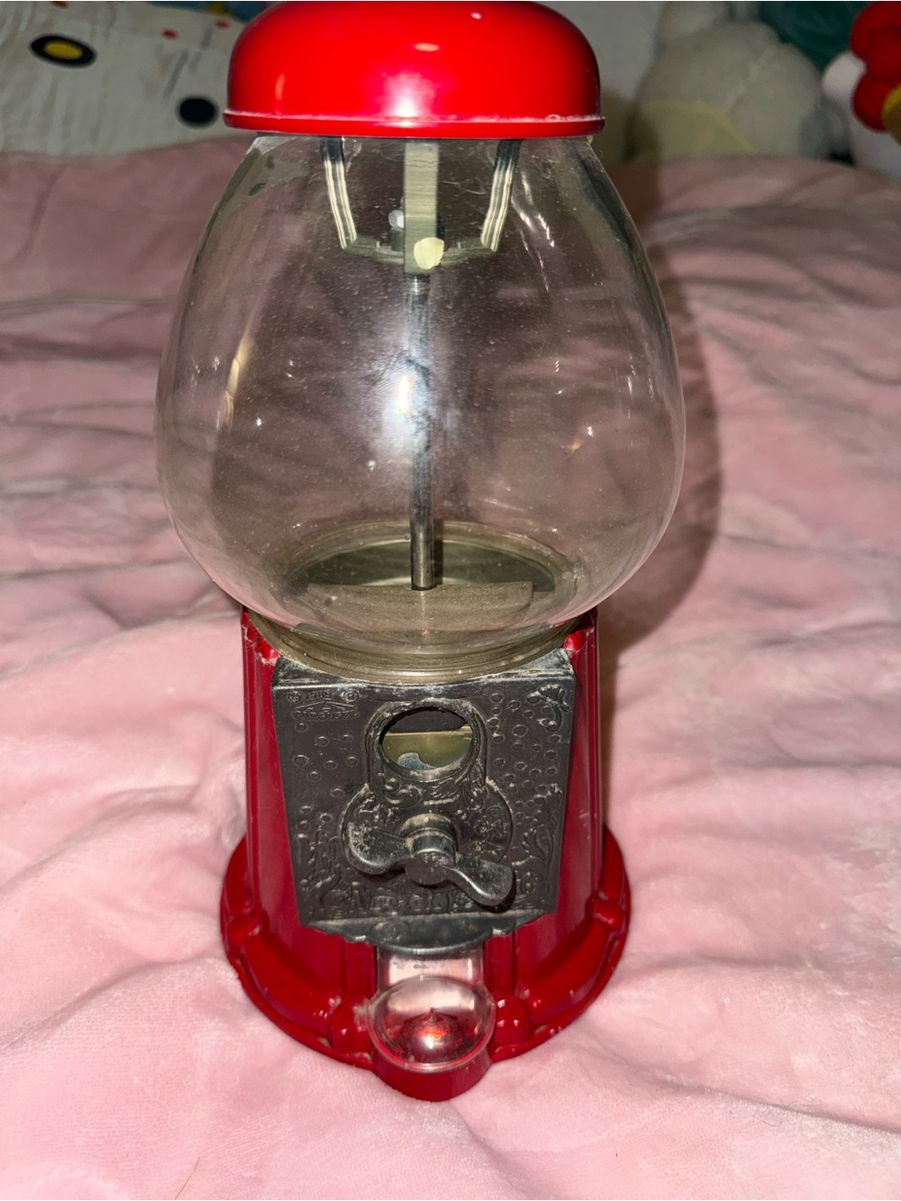 Red vintage gumball machine with glass globe and metal base 1989 carousel